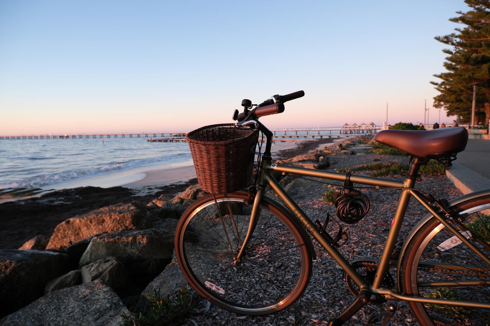 Family cycling along Busselton foreshore path